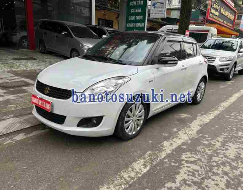 Cần bán gấp Suzuki Swift 1.4 AT đời 2016, màu Trắng