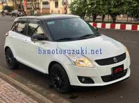 Cần bán xe Suzuki Swift 1.4 AT màu Trắng 2015